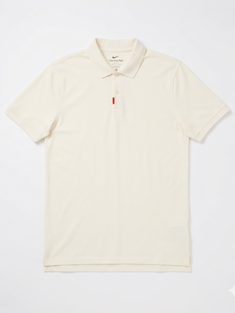 Nike Men's Off-White Polo Shirt with Subtle Red Accent